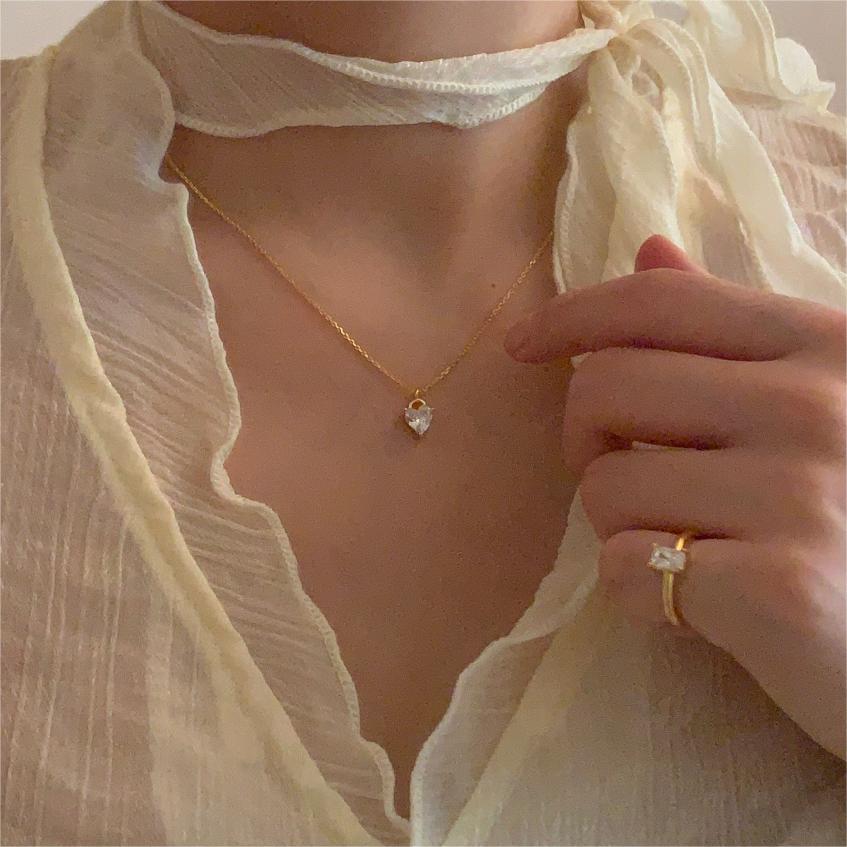 Collana con ciondolo a cuore minimalista in argento sterling 925 con zirconi cubici, catena regolabile
