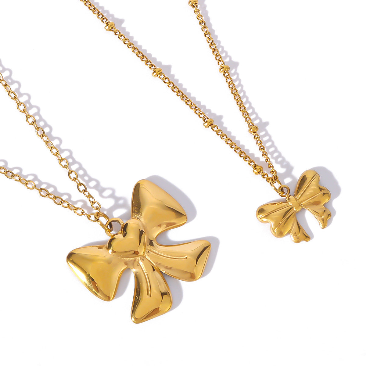 Collana da donna con ciondolo a fiocco geometrico in acciaio inossidabile placcato oro 18 carati, gioiello di moda ipoallergenico