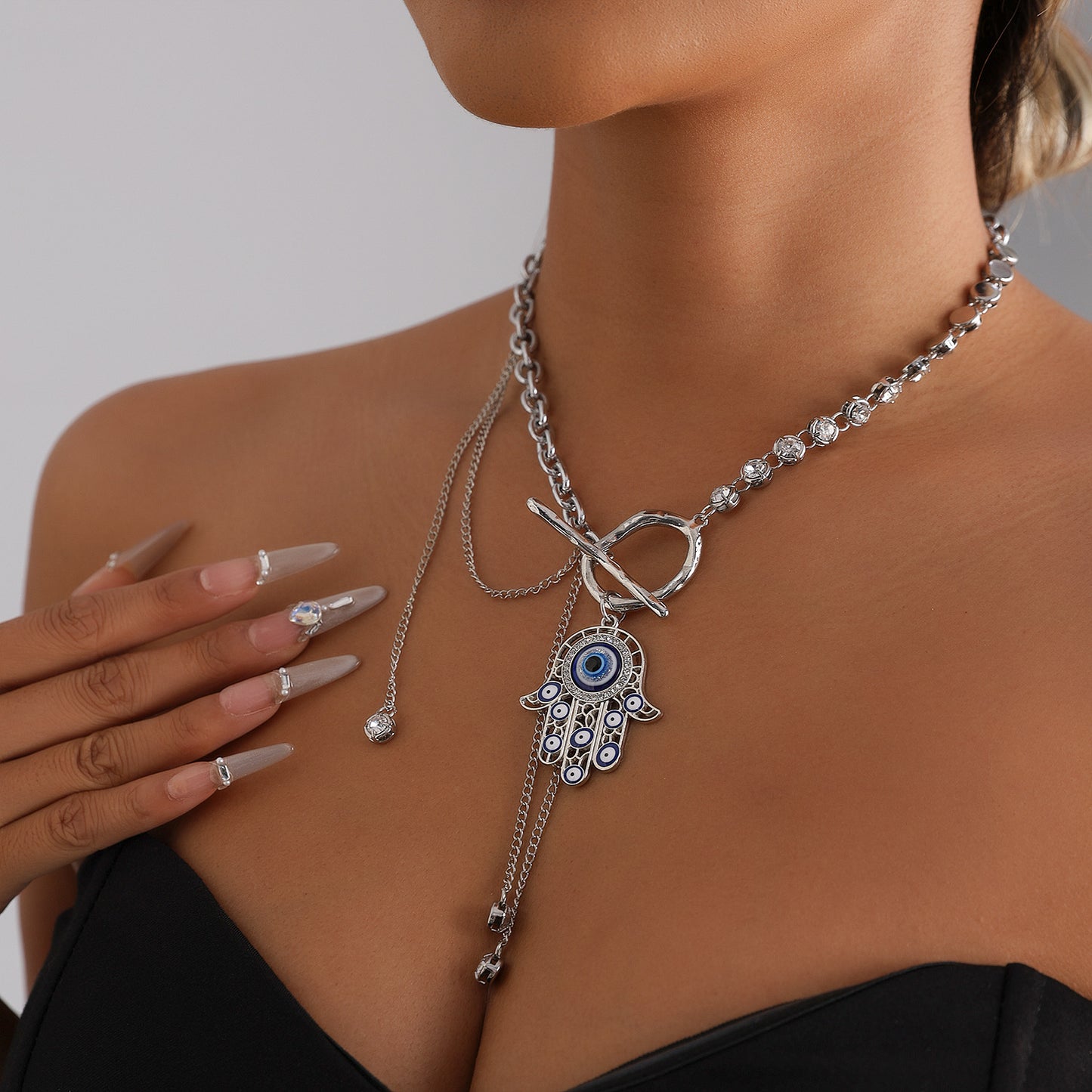 Luxury Elegant Hollow Palm Evil Eye Tassel Crystal Alloy Necklace for Women