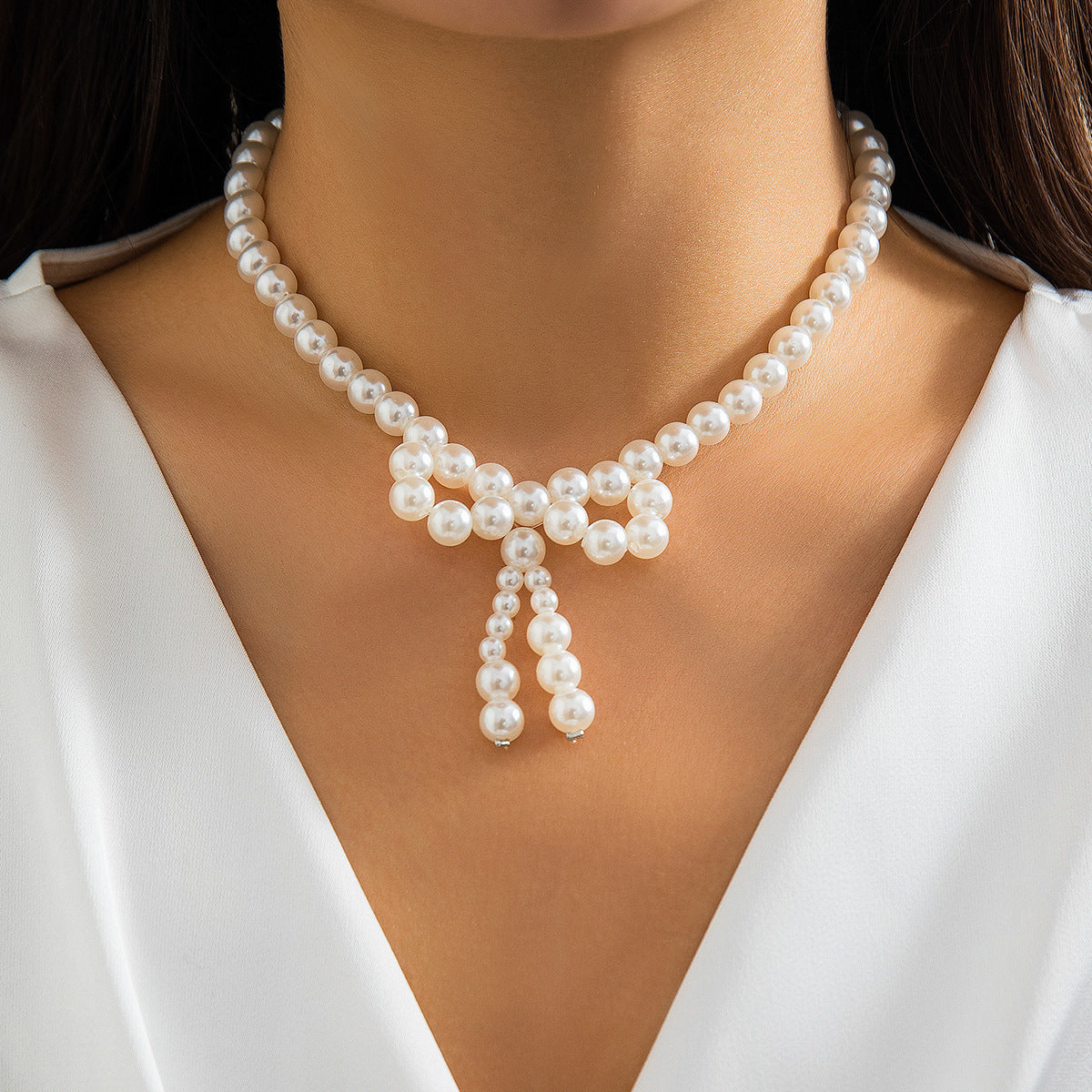 Minimalist Bow-Shaped Choker Necklace with Resin Beads and Round Ball Chain for Women