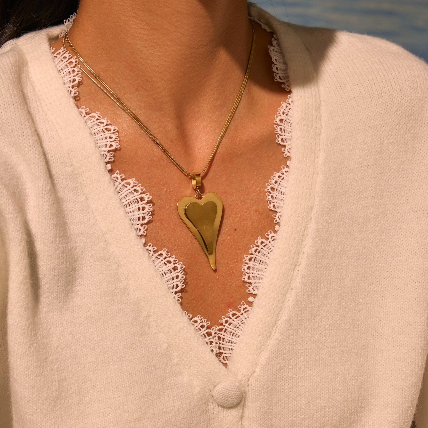 Collar de cadena de serpiente de doble corazón de moda en acero inoxidable con acabado chapado para mujer