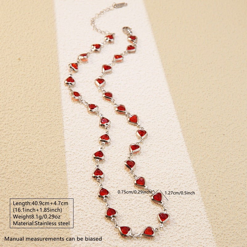 Elegante set collana e bracciale in acciaio inossidabile con zirconi cubici a cuore per donna