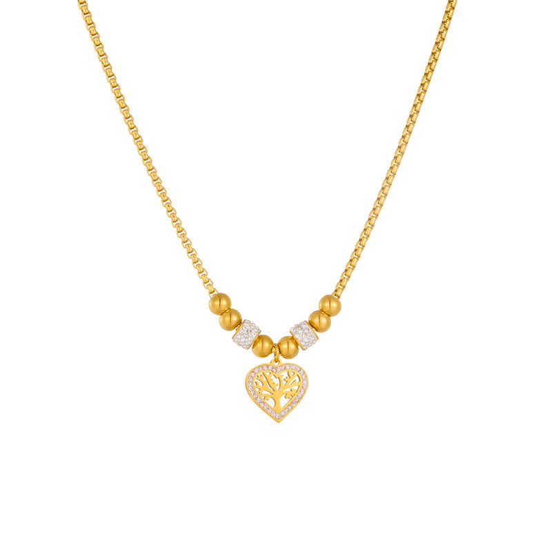 Elegante collar minimalista de acero de titanio con colgante en forma de corazón del Árbol de la Vida, chapado en oro y con cadena de cuentas para mujer