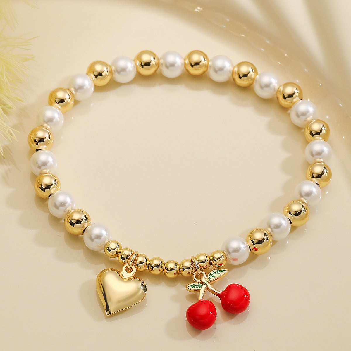 Fashion-Commuter Cherry and Heart-Shaped Pearl Beaded Bracelet for Women with Gold Plating on Copper