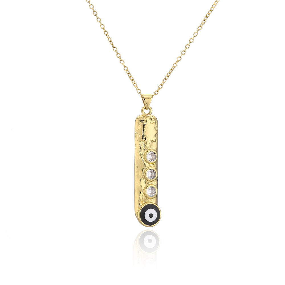 Collana con ciondolo a barra verticale geometrica con base in rame e placcatura in vero oro, design smaltato a occhio turco