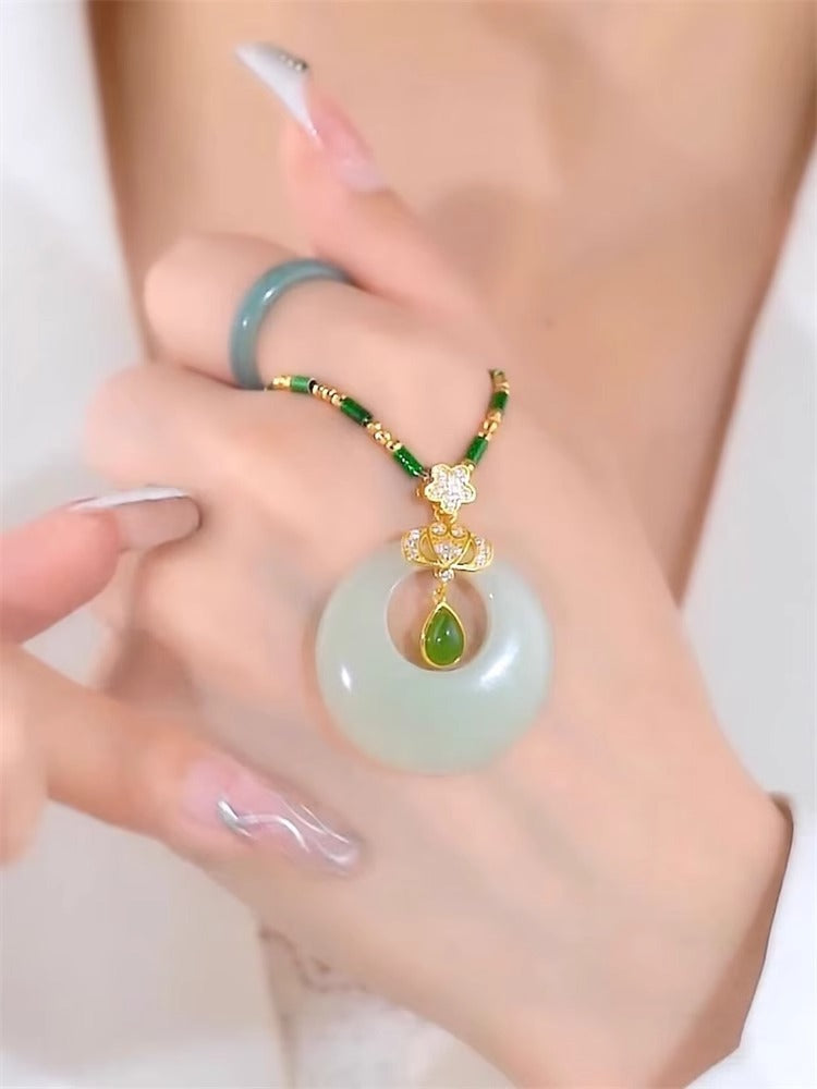 Collana a Forma di Goccia d'Acqua dal Design Originale in Acciaio al Titanio con Ciondolo in Rame Placcato Oro e Catena a O per Donne e Uomini
