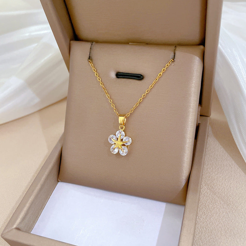 Collana da donna con ciondolo a stella in acciaio al titanio di lusso con intarsi di strass, design geometrico, delicata catena per la clavicola