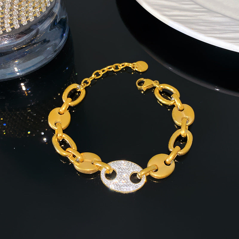 Light Luxury Titanium Steel Plated Rhinestone Pig Bracelet with Smile Detail
