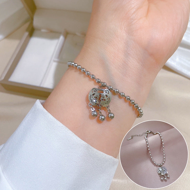 Pulsera de titanio chapada en oro con diseño de cierre Feng Shui para la longevidad, inspirada en Corea, con cuentas redondas y temática de la naturaleza para mujer
