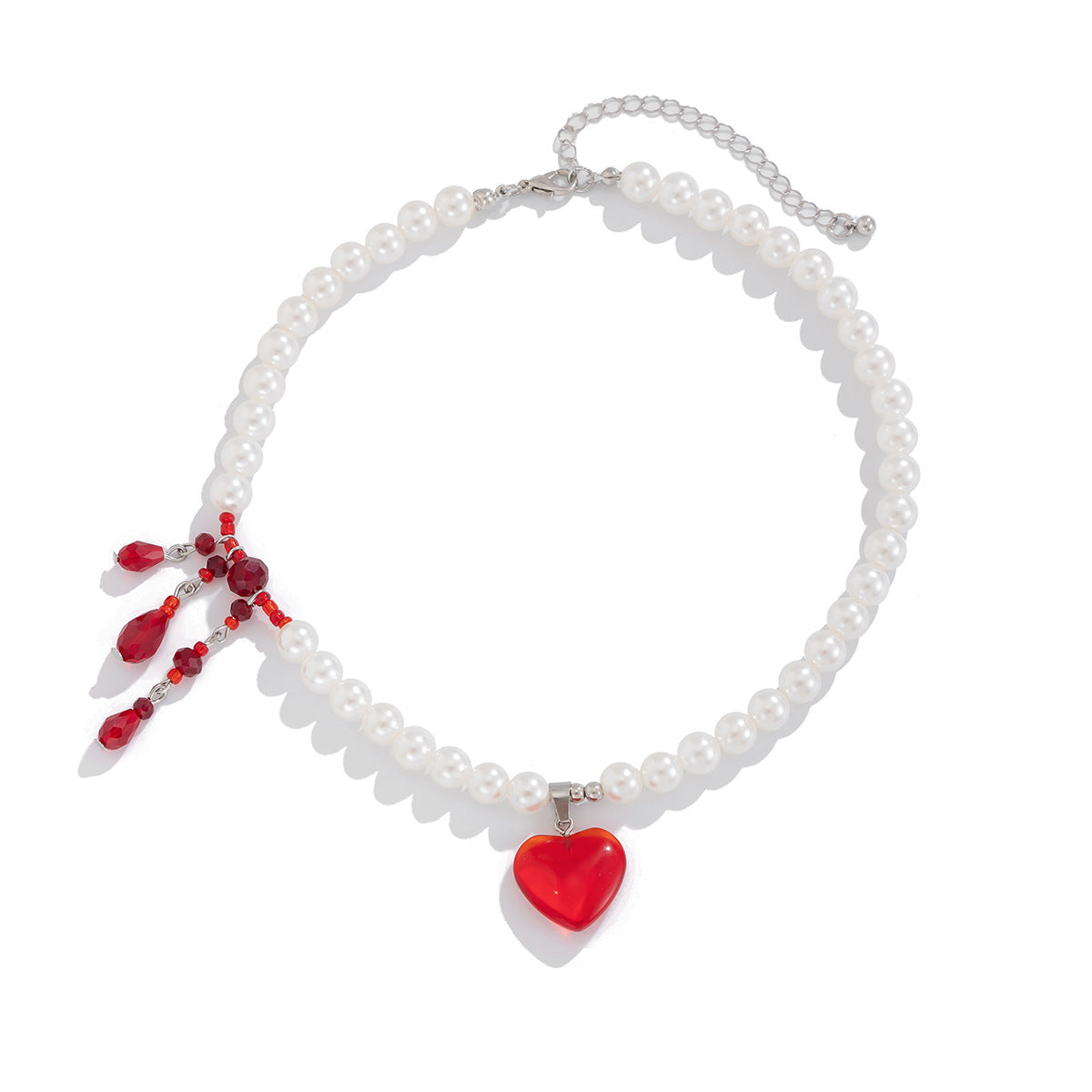 Collana con pendente a cuore e a goccia dolce e audace con perle imitation e strass, nappina e catena a sfere multistrato per donna