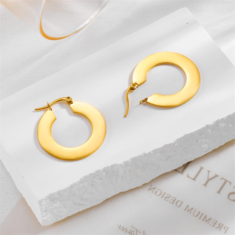 Minimalist Geometric Stainless Steel Hoop Earrings with Polished Finish and Cool-Tone Aesthetic