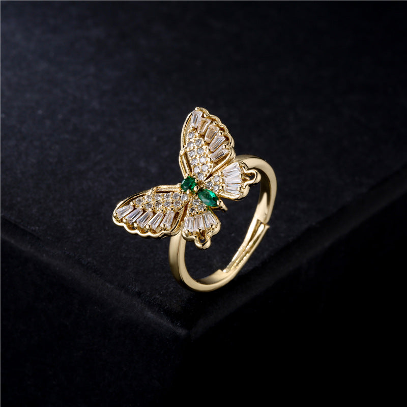 INS Style Geometric Butterfly Ring in Copper with Micro-Paved Cubic Zirconia and 18K Gold Plating