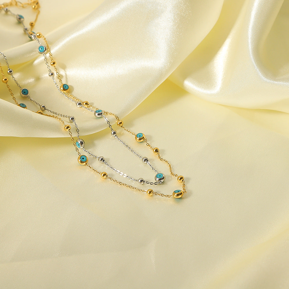 Collana da donna a serpente minimalista geometrica in acciaio inossidabile con intarsio in turchese, placcatura in oro 18K sottovuoto