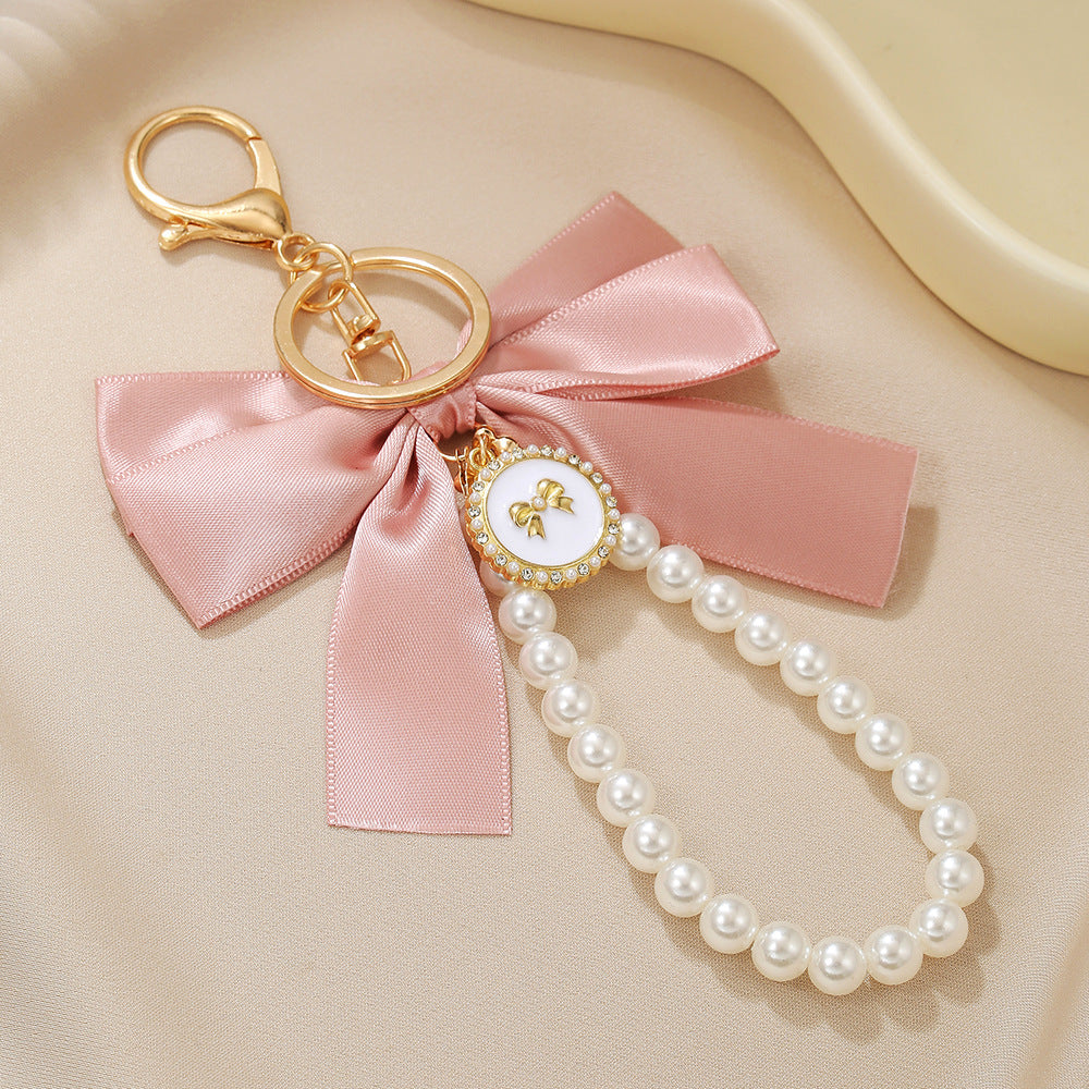 Sweet Cartoon Bow Pearl Zinc Alloy Keychain Bag Charm