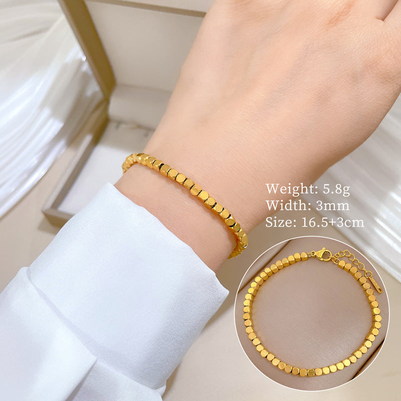 Bracciale Minimalista da Donna a Catena Box in Acciaio al Titanio Tonalità Fredde con Design Zodiacale e Intarsio in Oro