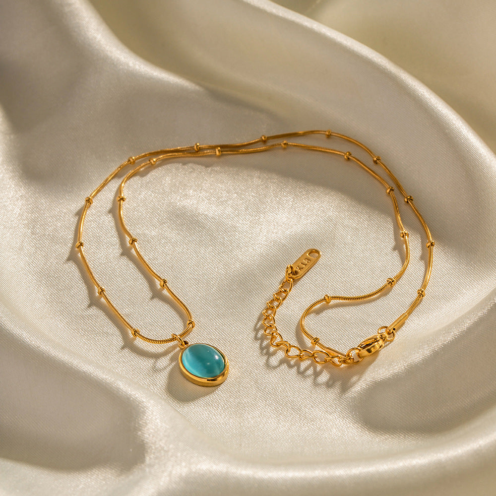 Collar con colgante de ojo de gato geométrico minimalista de acero inoxidable con baño de oro de 18 quilates para mujer