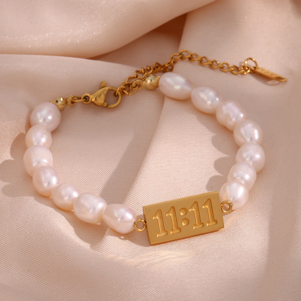 Bracciale da donna placcato in acciaio inossidabile geometrico alla moda con accento di perla d'acqua dolce