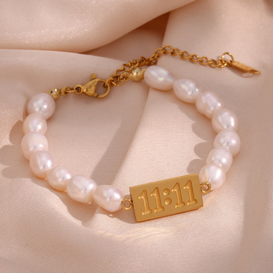 Bracciale da donna placcato in acciaio inossidabile geometrico alla moda con accento di perla d'acqua dolce