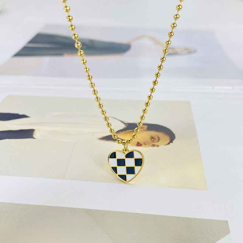Minimalist Heart-Shaped Titanium Steel Pendant Necklace with Black-and-White Checkerboard Pattern on O-Chain for Women
