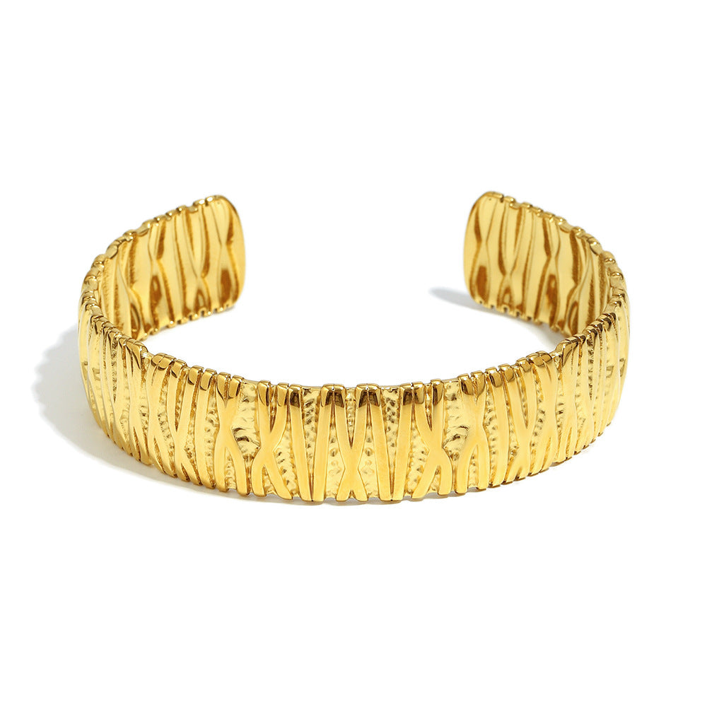 Pulsera de acero inoxidable para mujer de inspiración vintage con diseño vertical irregular ondulado y acabado chapado en oro de 18 quilates
