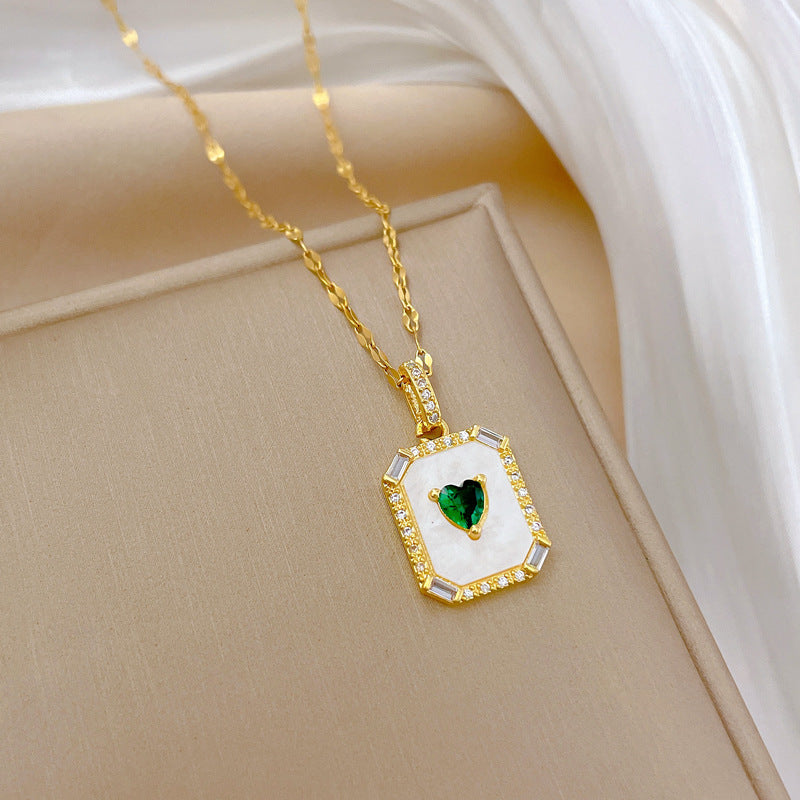 Collana con ciondolo a luna geometrico minimalista per donna e uomo, catena in acciaio inossidabile con elegante design a cornice ispirato alle conchiglie