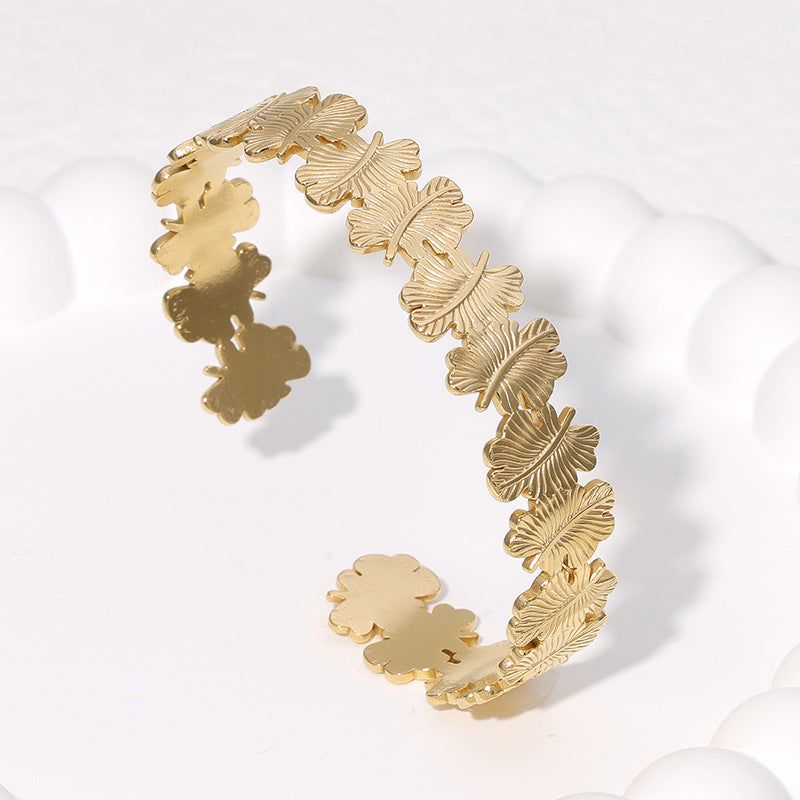Pulsera de Acero Titanio Minimalista Natural con Forma de Hoja con Baño de Oro para Mujer