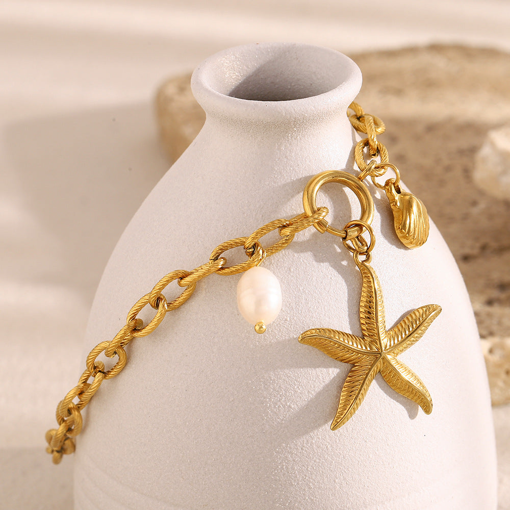 Cavigliera minimalista a forma di stella in acciaio inossidabile placcato oro 18 carati con accenti di perle da donna