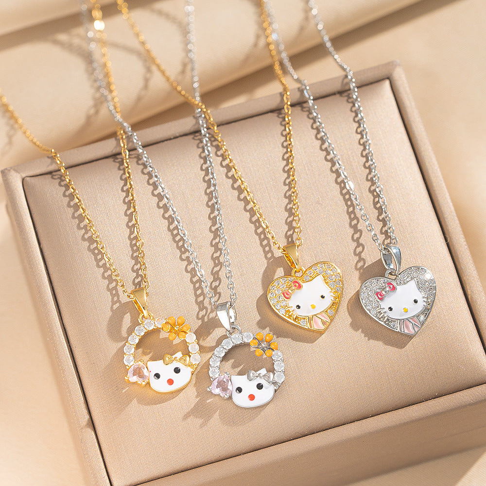 Collana con ciondolo dolce e carino a forma di gattino in acciaio al titanio placcato oro, con fiocco e design a fumetto, motivo a cuore, catena a O per donne