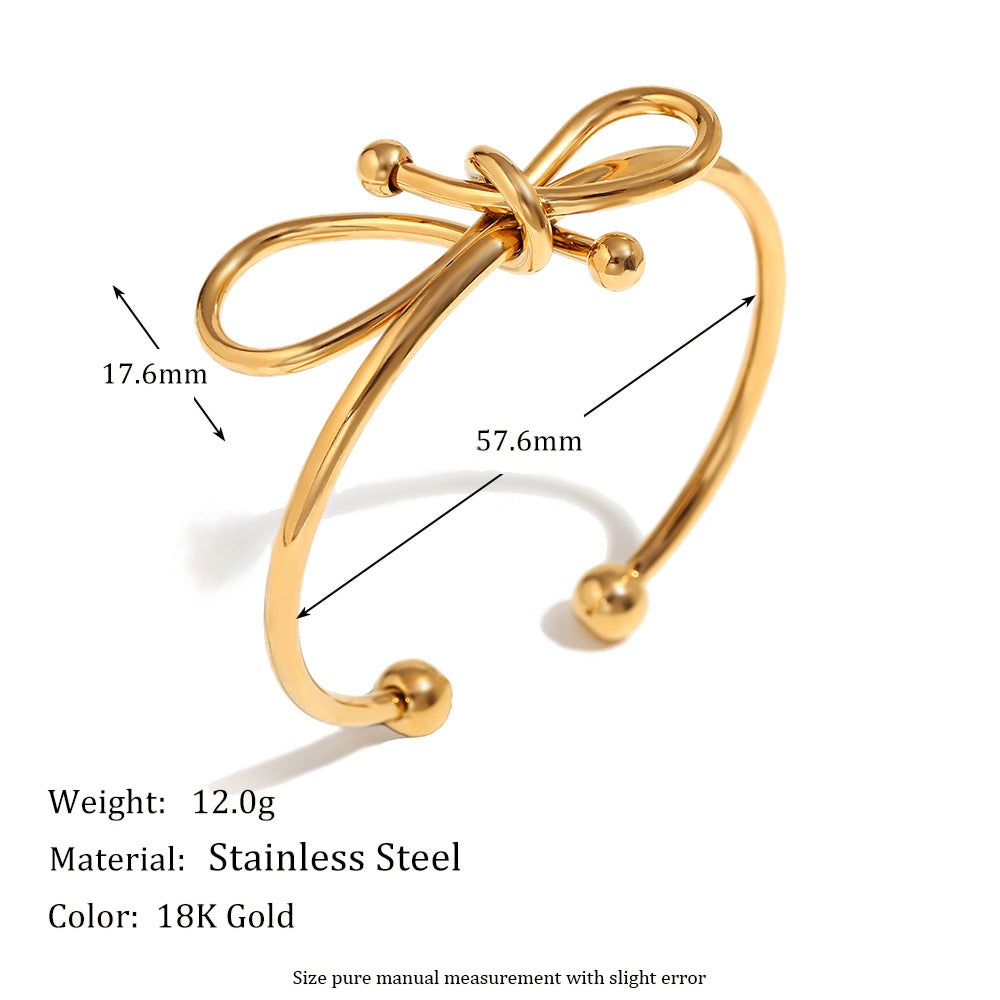 Bracciale da donna in acciaio inossidabile placcato oro 18K con fiocco, stile minimalista e alla moda