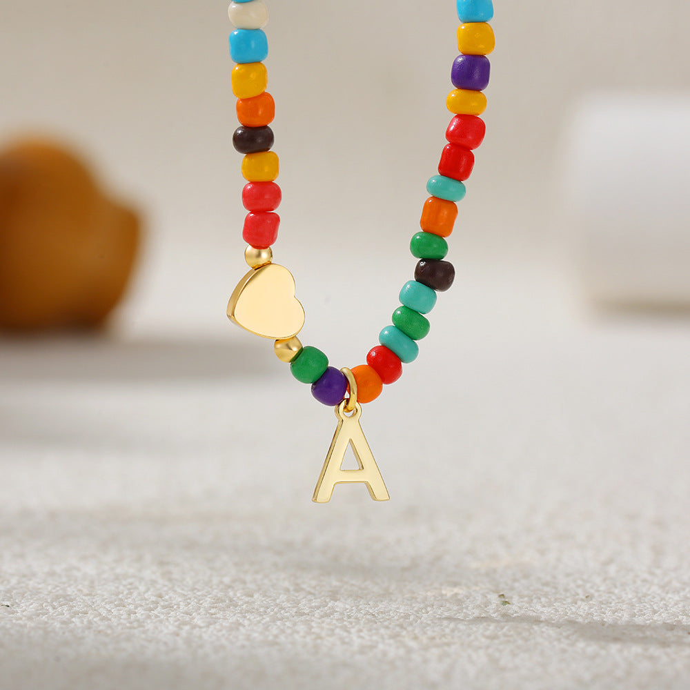 Collana Unisex Casual Placcata Oro 14K con Ciondolo a Cuore Lettera e Perline in Acciaio Inossidabile