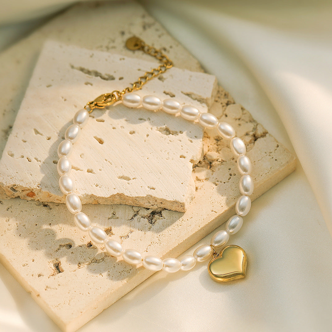 Minimalist Heart-Shaped Titanium Steel Bracelet with 18K Gold Plating and Pearl Accents for Women