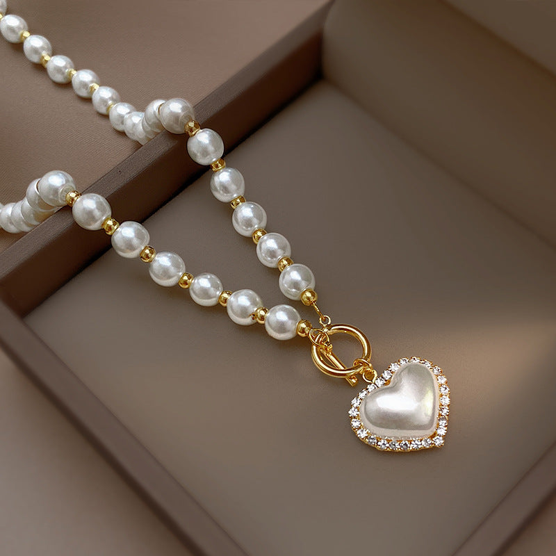 Chic Minimalist Heart-Shaped Pearl Necklace for Women with Alloy Chain and Electroplated Finish