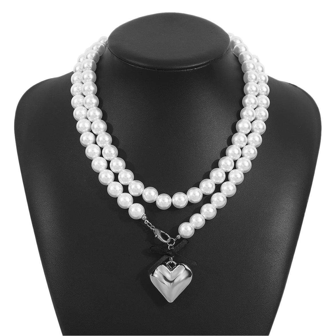 Dolce Collana con Fiocco a Nastro Minimalista a Cuore con Perla da Donna con Finitura Placcata e Delicata Catena per Clavicola