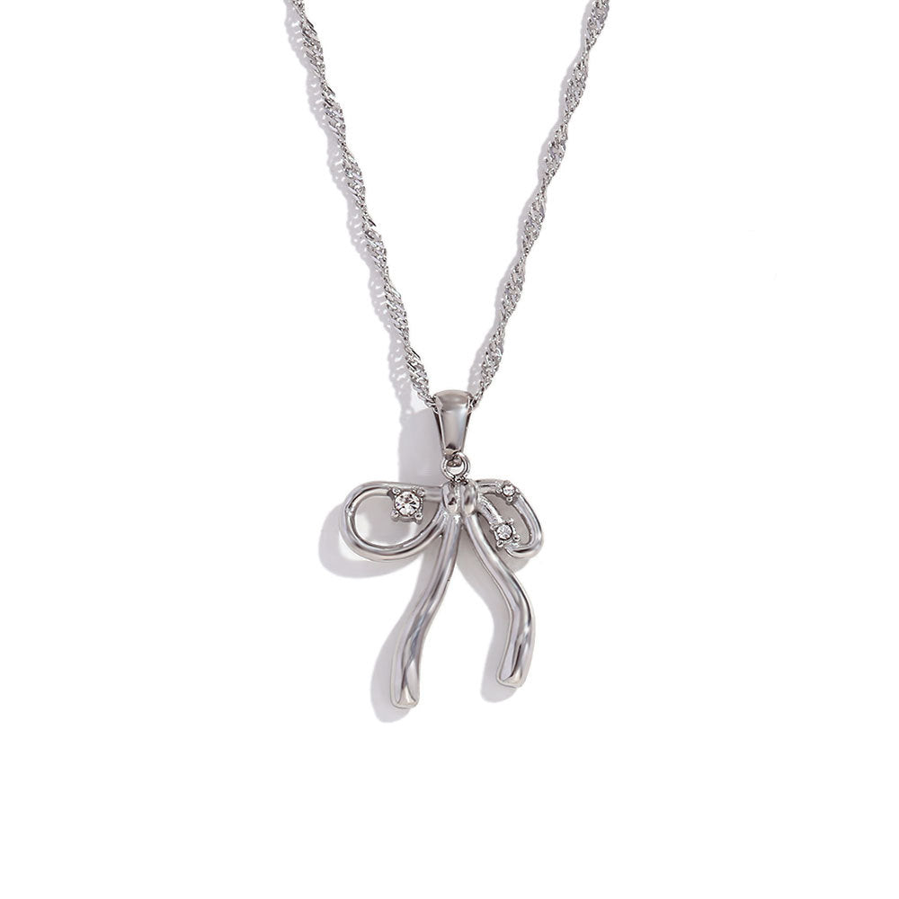 Collar de mujer de acero inoxidable chapado en oro de 18 quilates con forma de lazo de moda con detalles de diamantes de imitación
