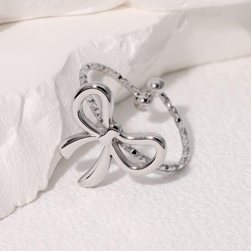 Anello da donna in acciaio inossidabile a forma di fiocco, aperto e placcato oro