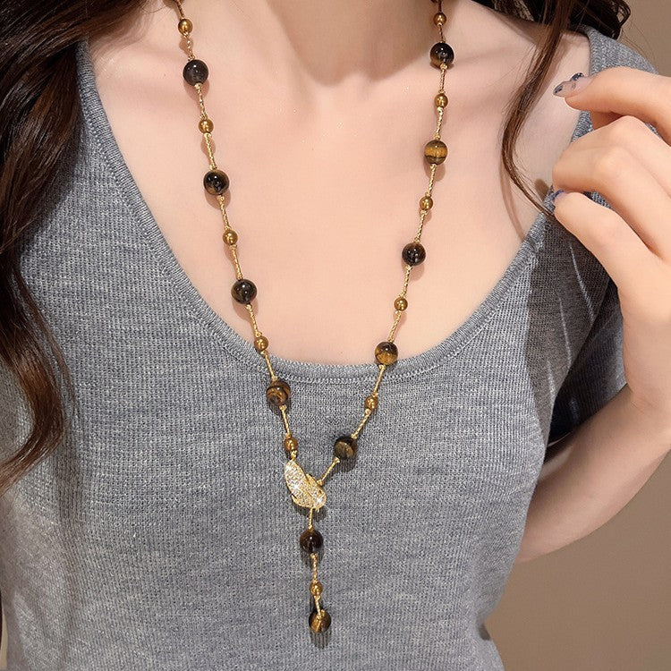 Collana pendente occhio di tigre in stile retrò con design geometrico da donna, catena a maglie color oro, accessorio minimalista di lusso