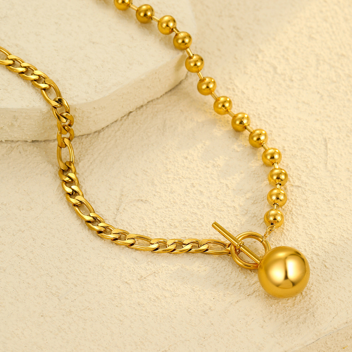 Collana da donna vintage in acciaio al titanio con perline tonde cave minimaliste e chiusura a moschettone