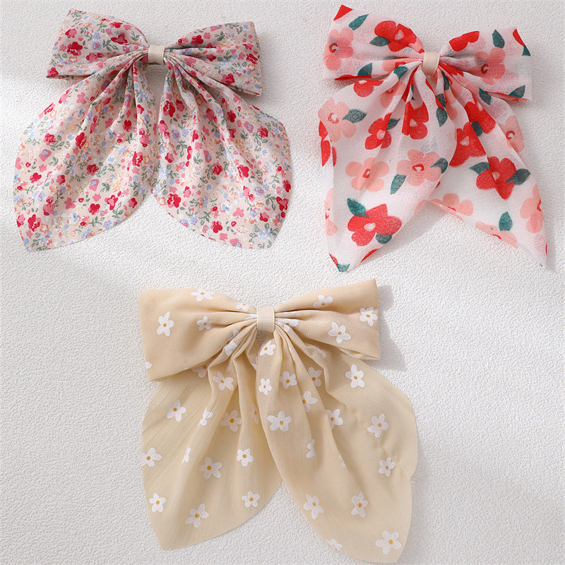 Set di fermagli per capelli con fiocco in tessuto stile dolce per bambini con stampa floreale e piccoli nastri decorativi