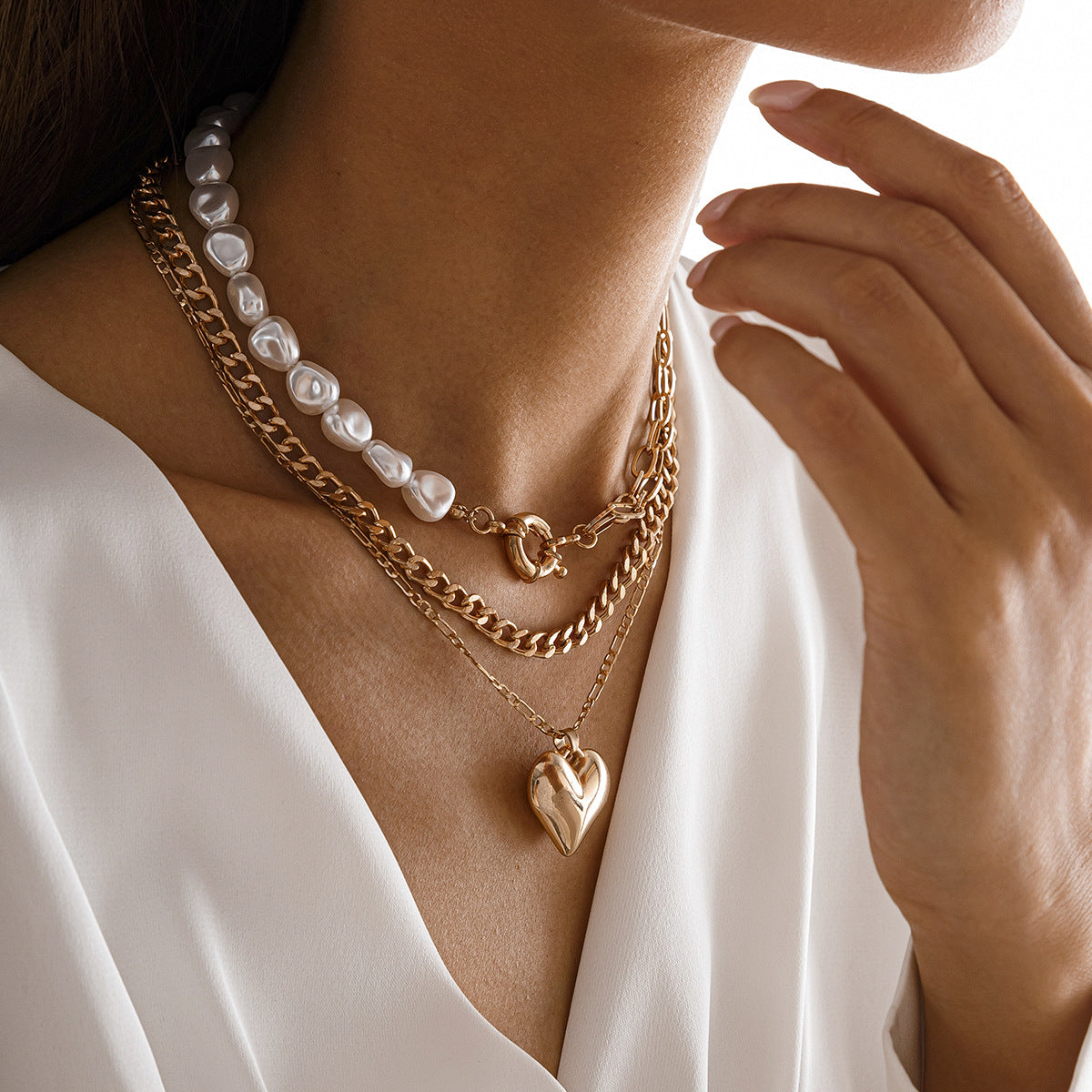 Sweet and Edgy Asymmetrical Heart Pendant Necklace in Alloy with Electroplated Finish on Multi-Layer Cross Chain for Women