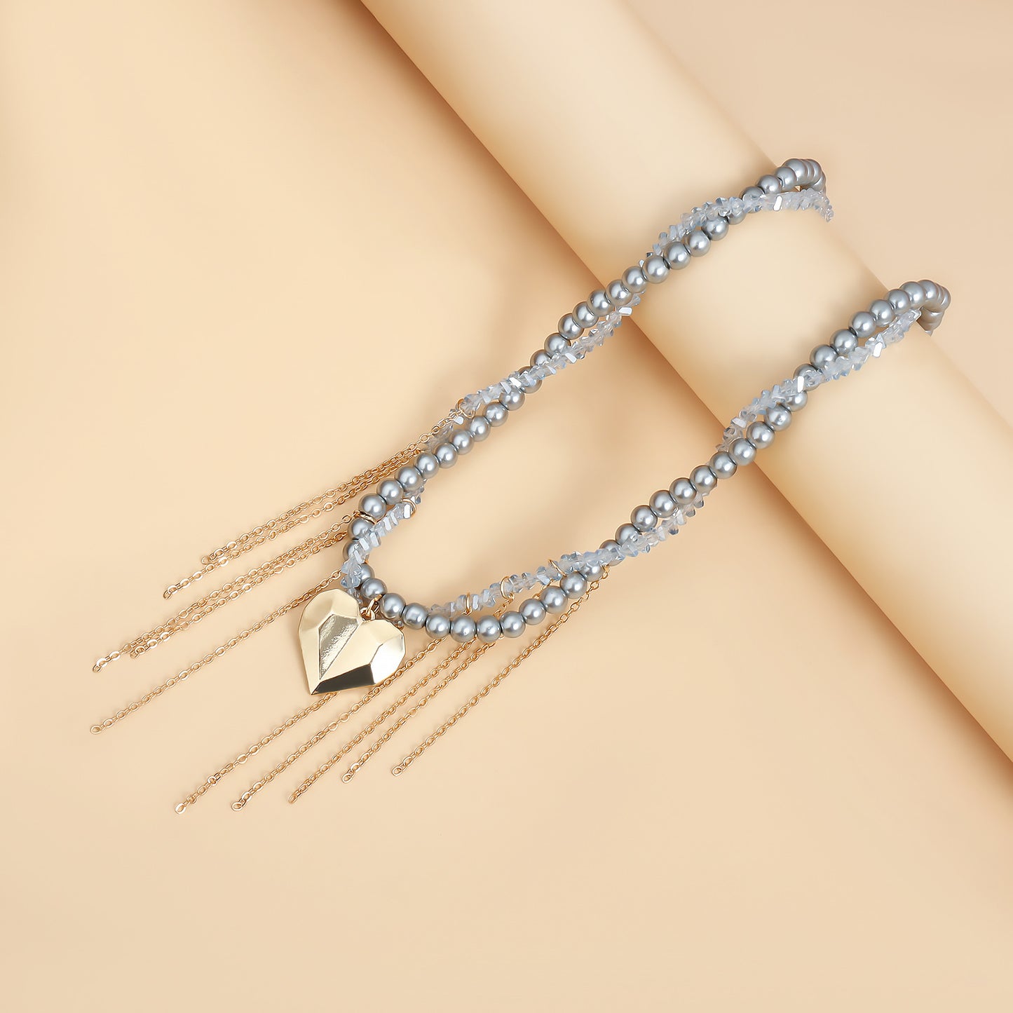 Elegant Crystal Heart Pendant Necklace with Tassel Detail on Gold-Plated Alloy Chain for Women