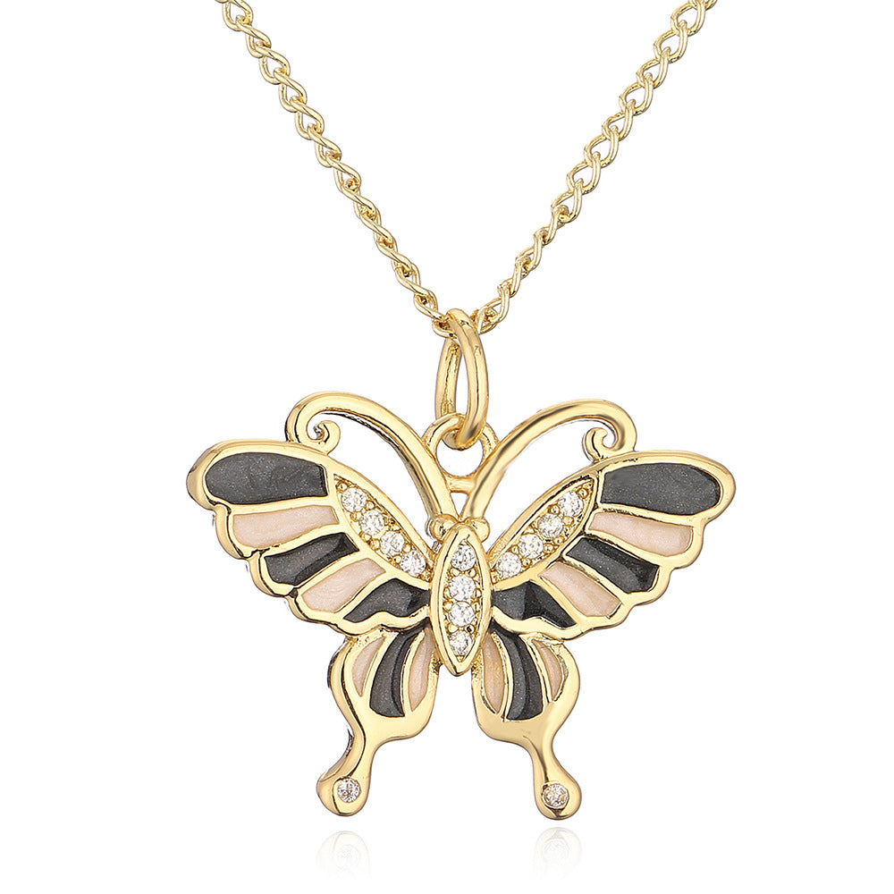 Minimalist Butterfly Pendant Necklace for Women with Copper Base Plated in 18K Gold and Enamel Finish Featuring Cubic Zirconia Accents