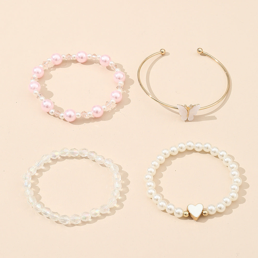 Juego de pulseras de aleación con forma de corazón y mariposa para niñas con detalles de perlas, pulsera de moda minimalista para niñas