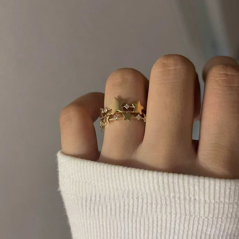 Anillo abierto de lujo francés retro con forma de estrella para mujer con incrustaciones de circonita cúbica en cobre