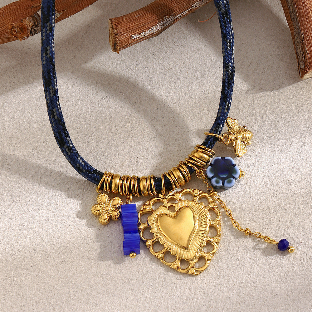 Luxury Vintage Style Hollow Heart Pendant Necklace in Stainless Steel with 18K Gold Plating