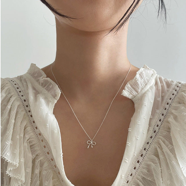 Minimalist Bow Knot Necklace in 925 Sterling Silver with Geometric Outline and Fresh Sweet Aesthetic