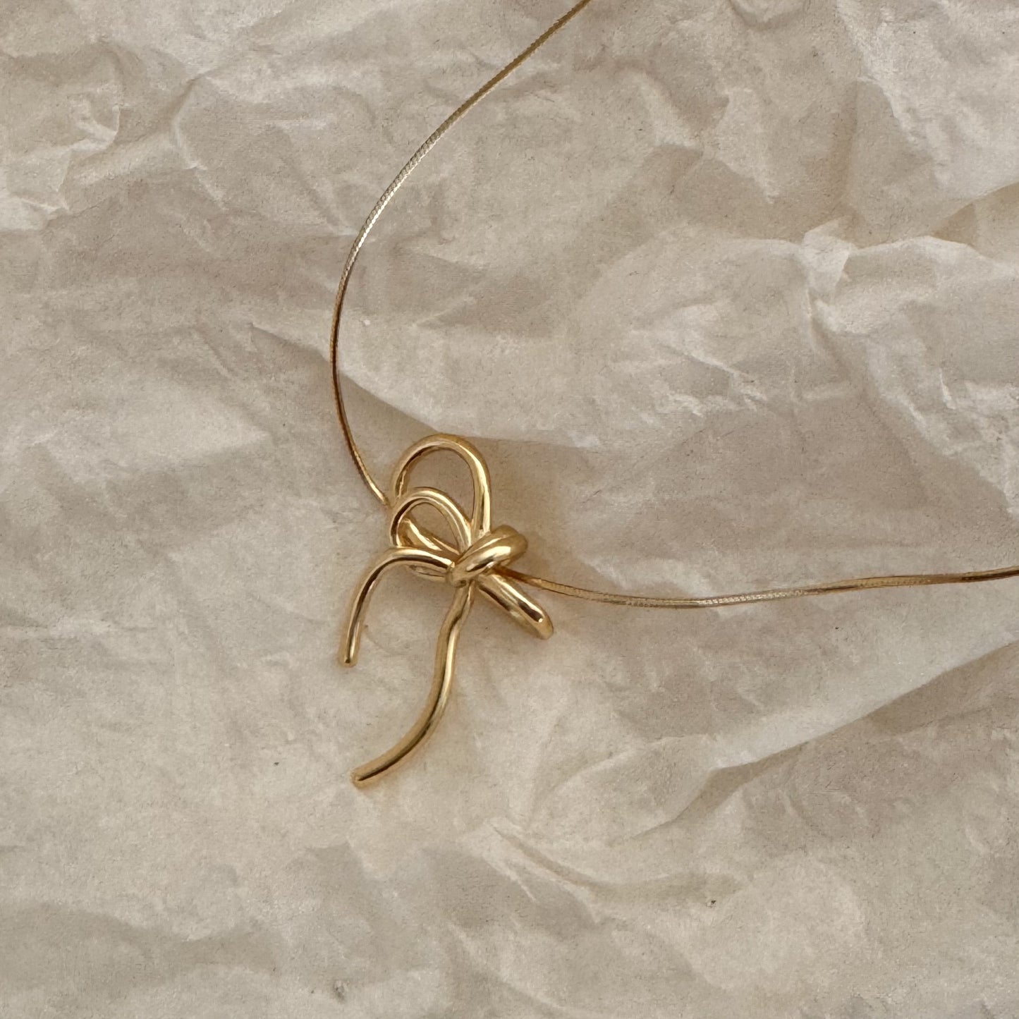 Minimalist Bow-Shaped 925 Sterling Silver Necklace with Plated Finish on Snake Chain