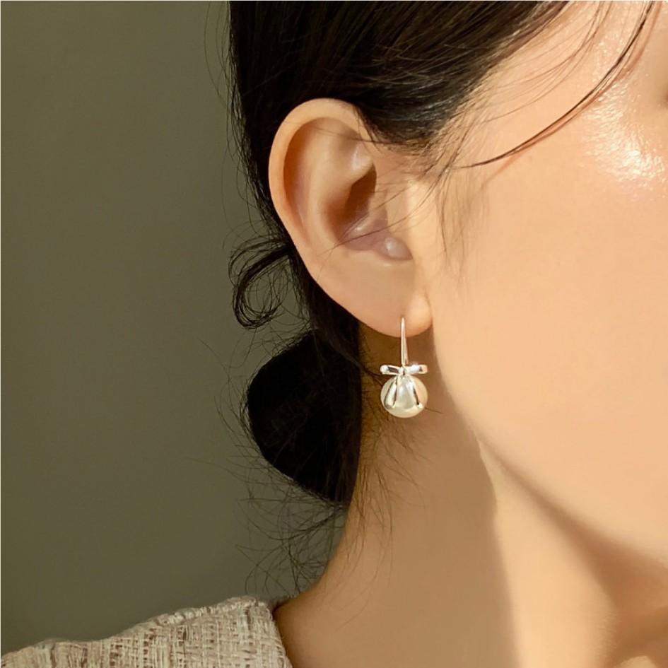 Sweet Bowknot Pearl Stud Earrings in 925 Sterling Silver with Teardrop Shape