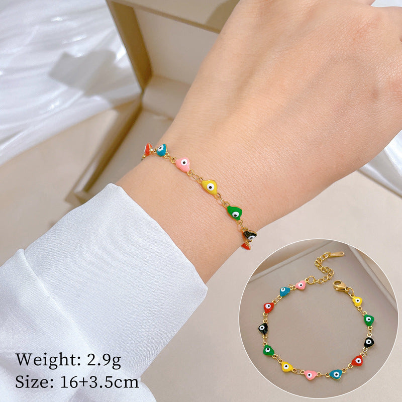 Vintage Women's Titanium Steel Rope Chain with Round Beads and Roman Numerals Gold Plated Wave Texture Four-Season Bean Hand Chain