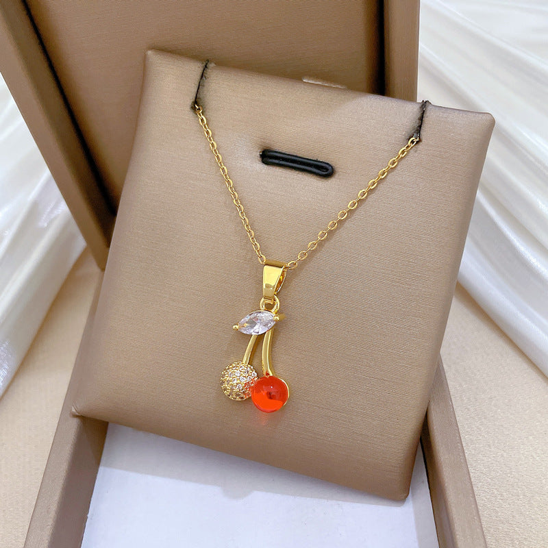 Collar de acero inoxidable con forma de cereza de dibujos animados con incrustaciones de diamantes de imitación para mujeres y hombres, delicada cadena de clavícula