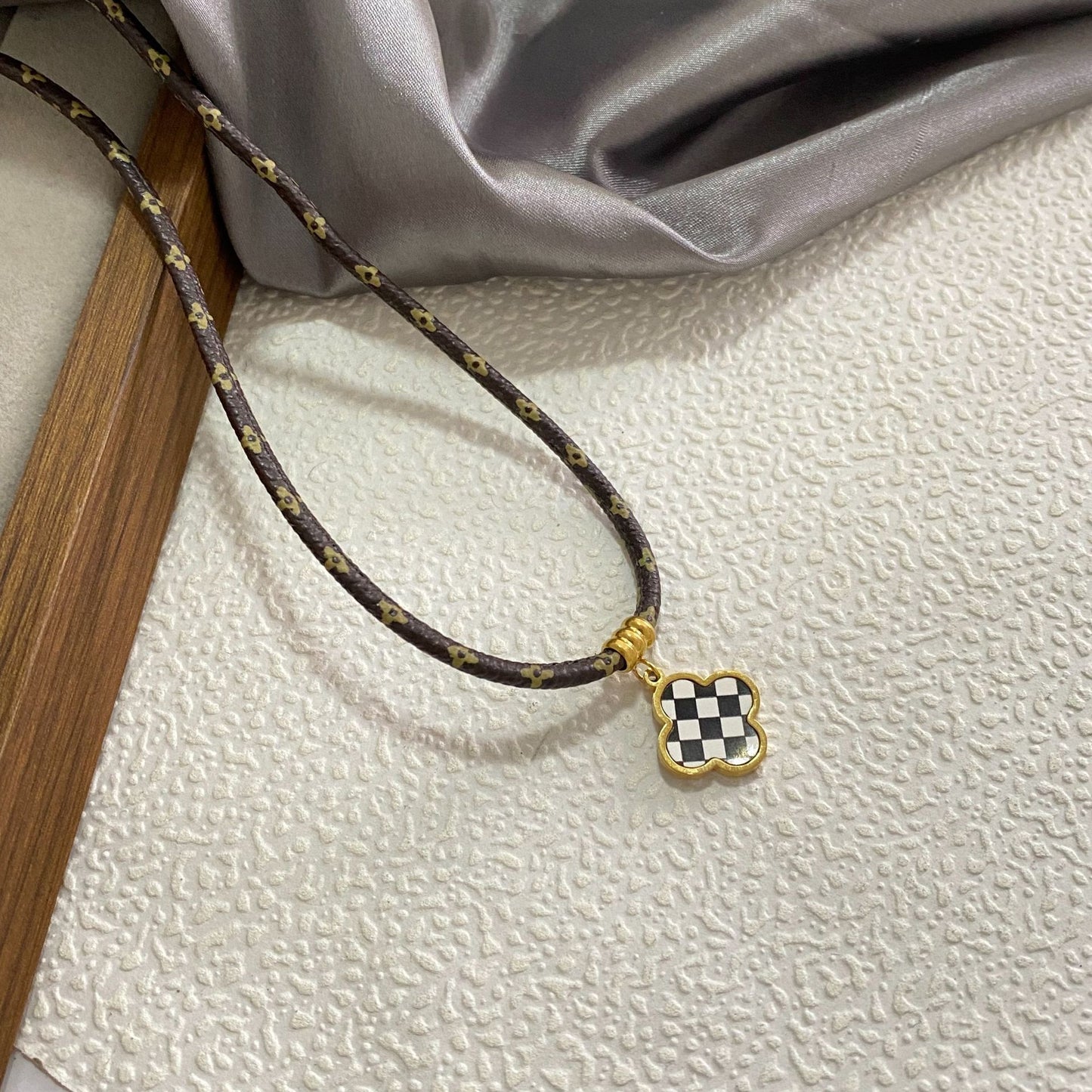 Fashion Minimalist Luxury Gold Plated Titanium Steel Black and White Checkered Clover Necklace for Unisex
